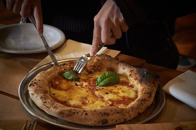 Descuentos en FUEGO PIZZAS DEL MUNDO con Club LA NACION