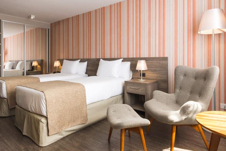 Descuentos en FRONTIER HOTEL RIVERA con Club LA NACION